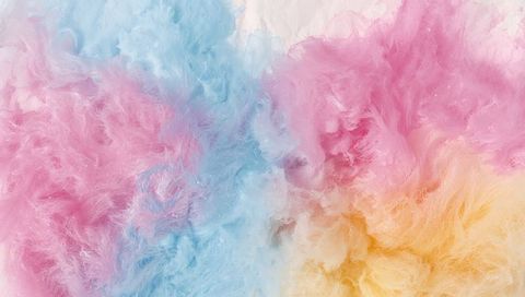 Evoking cotton candy clouds: pastel pink blue peach fluffy fiber texture
