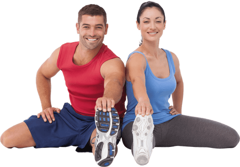 Smiling fitness couple stretching legs transparently