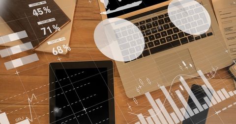 Analyzing Financial Data on Laptop and Tablet for Business Strategy - Download Free Stock Images Pikwizard.com