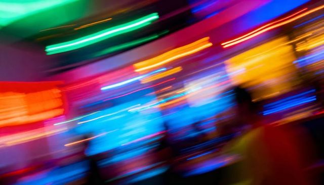 Neon Motion Blur: Vibrant Nightlife Light Trails and Colorful Abstract Club Streaks