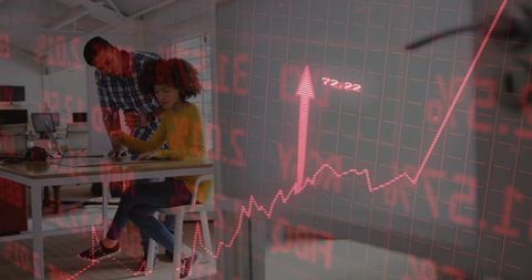 Coworkers Collaborating in Office with Stock Market Overlay