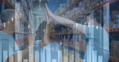 Warehouse team celebrating success amidst digital financial overlays