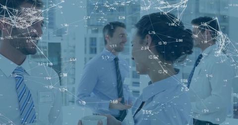 Corporate team collaborating with data overlay and glass partitions in office