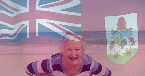 Elderly woman enjoying sunny beach vacation in bermuda