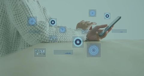 Seated female hands tapping smartphone with futuristic HUD overlays and wristwatch, mobile