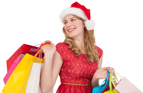 Woman wearing Santa hat holding several colorful shopping bags, exuding excitement for holiday shopping. Suitable for advertising holiday-related retail events or sales. Useful for promotional materials and festive content with transparent adjustments to creative designs.