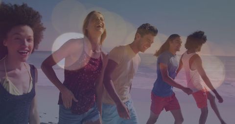 Diverse Friends Enjoying Bright Beach Day Together