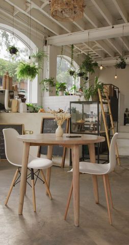 Cozy Modern Cafe Interior with Minimalist Decor - Download Free Stock Images Pikwizard.com
