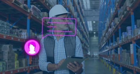 Warehouse supervisor inspecting inventory with tablet in high-bay distribution aisle