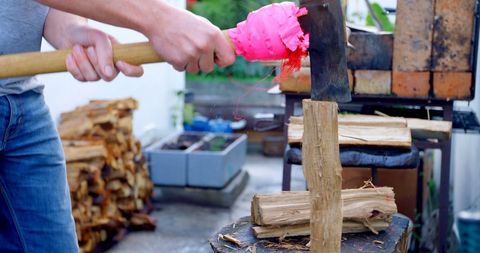 Caucasian Lumberjack Chopping Wood with Axe Outdoors - Download Free Stock Images Pikwizard.com