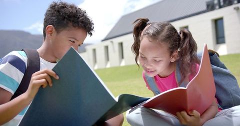 Curious Children Reading Outdoors at School - Download Free Stock Images Pikwizard.com
