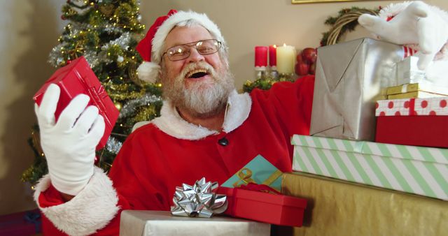 Joyful Santa Claus with Presents Mid Celebration - Download Free Stock Images Pikwizard.com
