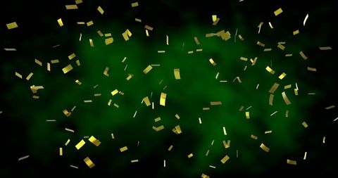 Golden confetti falling on glowing green background party