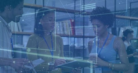 Colleagues Collaborating in Modern Office with Digital Interface Layer