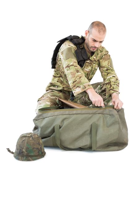 Solider packing his bag - Download Free Stock Photos Pikwizard.com
