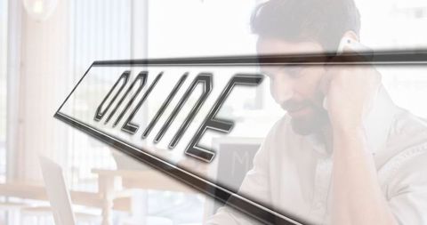 Business Professional Engaged in Work with ONLINE Overlay