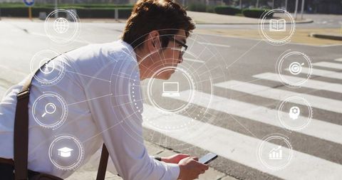 Leaning asian businessman checking smartphone at crosswalk with ar hud overlay city commute