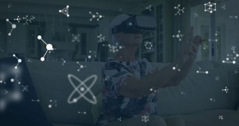 Senior woman exploring virtual reality with tech visuals