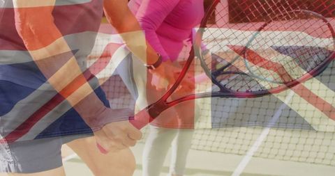 Tennis duo at net overlaid with uk flag for team spirit