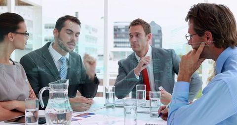 Professional Team Strategizing in Modern Office Environment