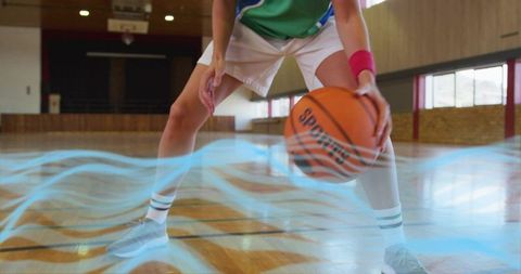 Female Athlete Dribbling Basketball with Energetic Aura Effect