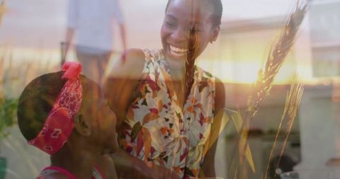 Mother and Daughter Smartly Cleaning Glass with Friendship and Fun