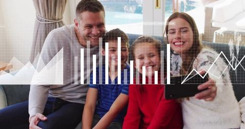 Family taking selfie on sofa with digital analytics overlay showing bar and line charts