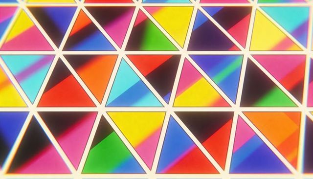 Vibrant prism triangle grid abstract geometric tessellation with rainbow gradients