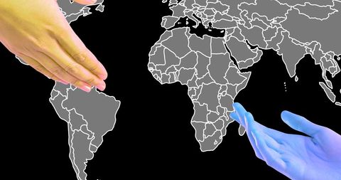 Symbolic Handshake over World Map Representing Global Communication - Download Free Stock Images Pikwizard.com