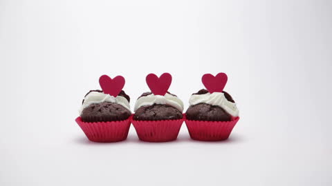 Chocolate Cupcakes with Heart Toppers on Valentine Theme