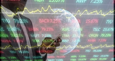 Businessman holding smartphone monitoring global stock market data with globe and tickers