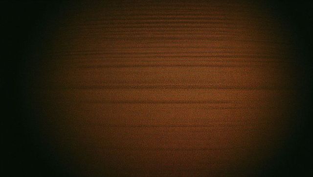 Abstract Brown Gradient with Vignette and Textured Pattern