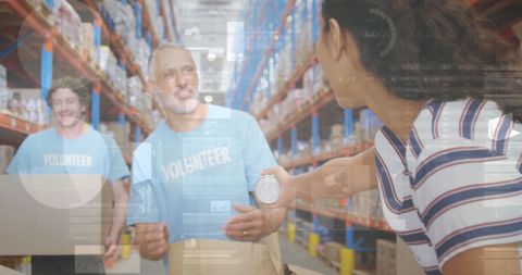 Volunteers Working at Food Bank Warehouse with Digital Overlay - Download Free Stock Images Pikwizard.com