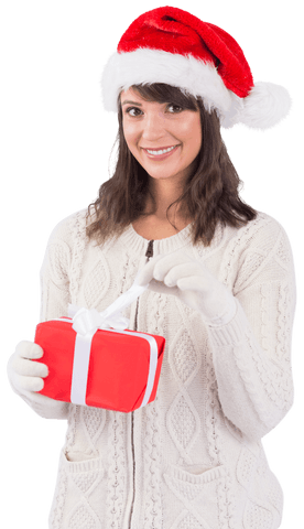 Young woman in santa hat holding red gift with bow on transparent background