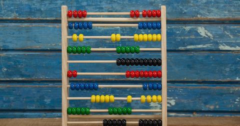 Colorful Wooden Abacus for Math Education on Rustic Background - Download Free Stock Images Pikwizard.com