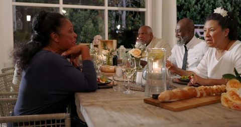Senior Friends Enjoy Intimate Backyard Celebration Dinner