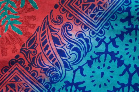 Vibrant red-to-teal paisley batik pattern for boho textile, sarong, home decor