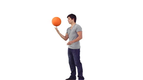 Man Spinning Basketball Against White Background in Profile