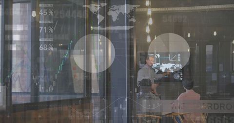 Businessman Presenting Data on Transparent Display