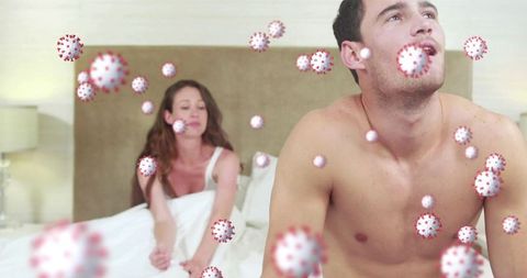 Stressed couple with visual coronavirus cells bedroom tension