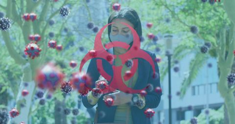 Woman with mask using smartphone amid covid-19 symbols