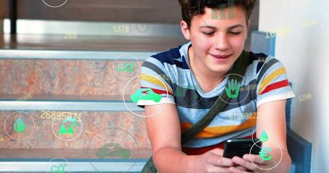 Teen using smartphone on stairs with ar eco icons, learning, gaming, mobile technology