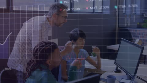 Diverse Team Analyzing Data on Computer with Digital Graphics Overlay