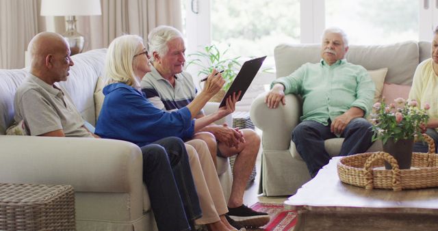 Senior Friends Spending Time Together in Comfortable Living Room - Download Free Stock Images Pikwizard.com