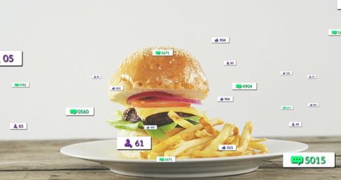 Gourmet cheeseburger with fries surrounded by floating social media engagement icons