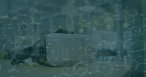 Chemical Formulas Overlaying VR Headset in Technology Lab