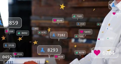 Man at cafe viewing floating social media notifications and engagement icons