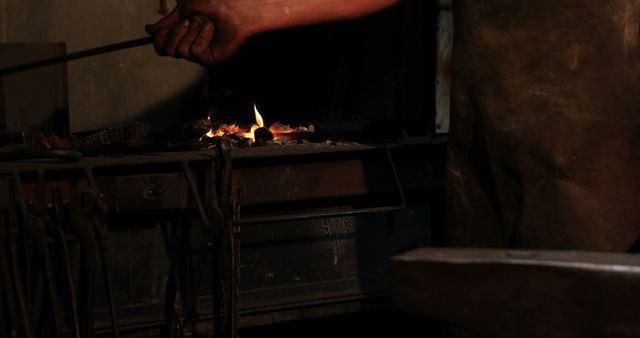 Blacksmith Forging Metal in a Workshop - Download Free Stock Images Pikwizard.com