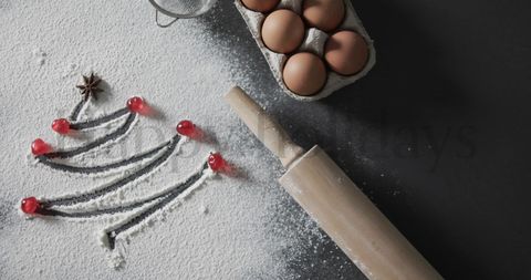 Festive holiday baking scene with flour-dusted christmas tree