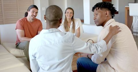 Friends Relaxing Together at Home in Casual Comfort